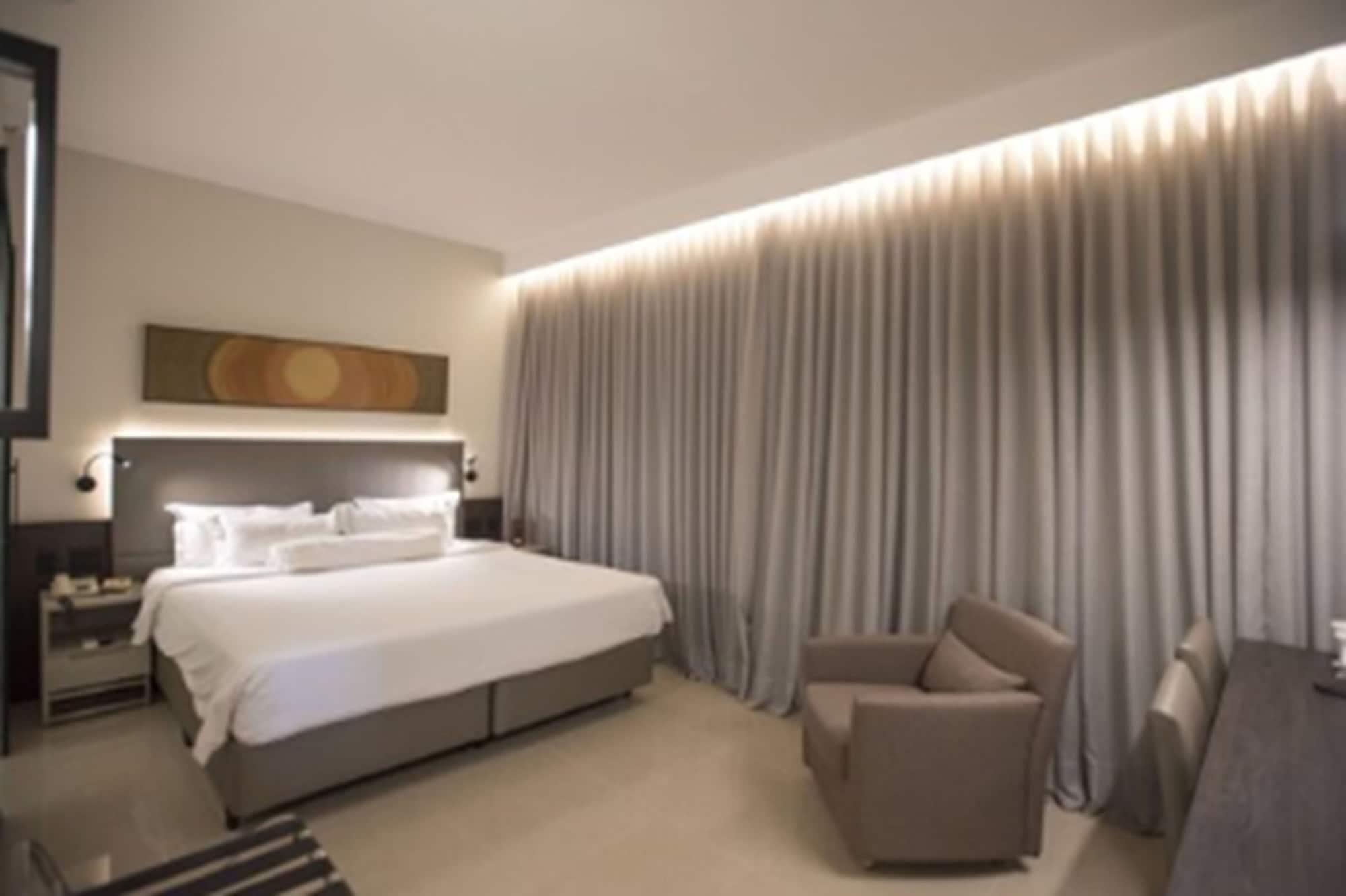 Royal Boutique Savassi Hotel 벨루오리존치 외부 사진 A bedroom at the hotel