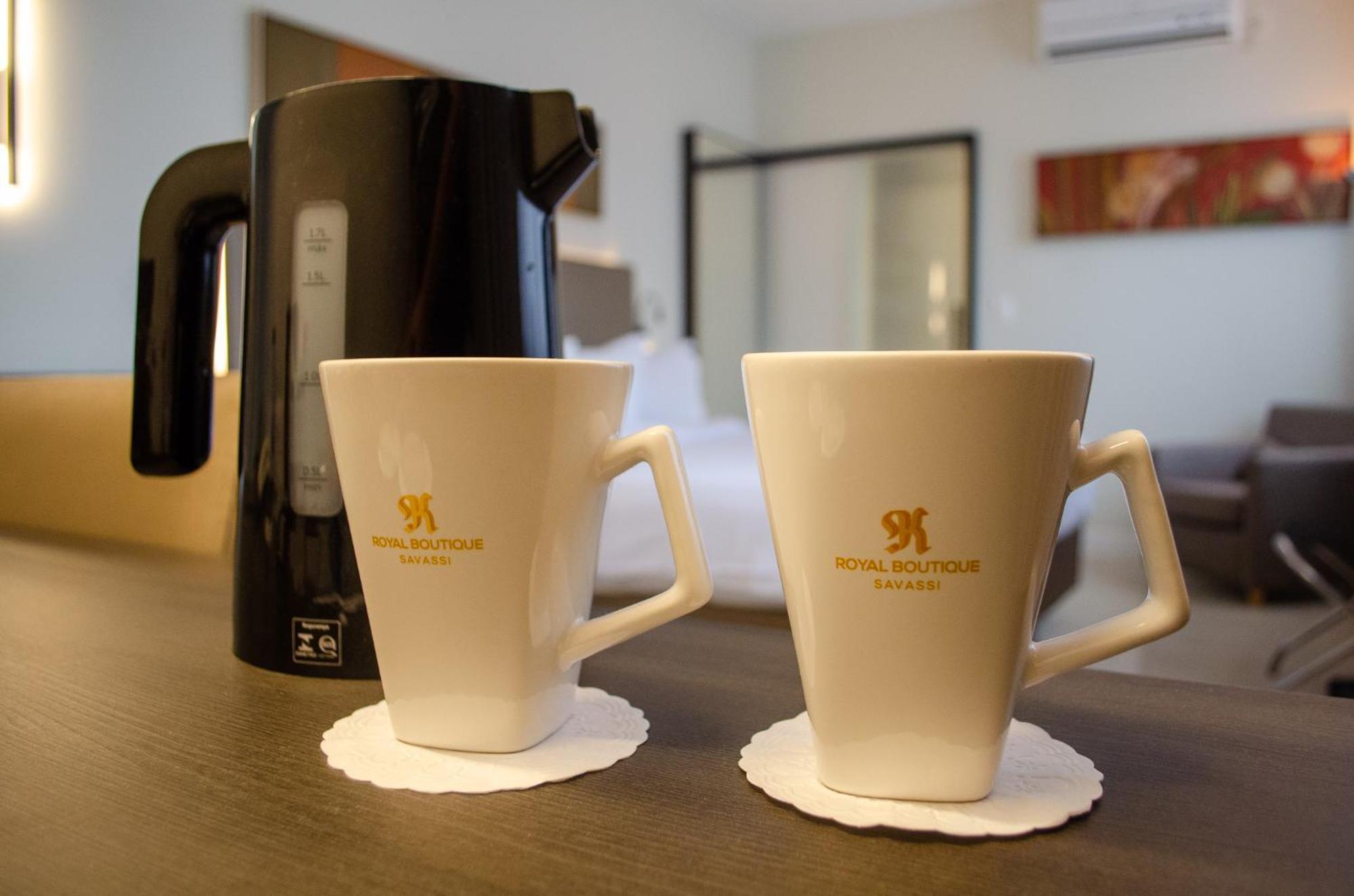 Royal Boutique Savassi Hotel 벨루오리존치 외부 사진 A kettle and two cups